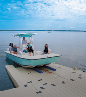 Family loading onto boat launch