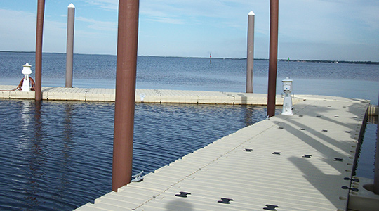 A V-shaped dock floats on the water