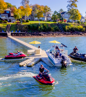 A jet ski takes off from a dock