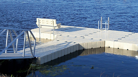 View from land of floating dock with gangway