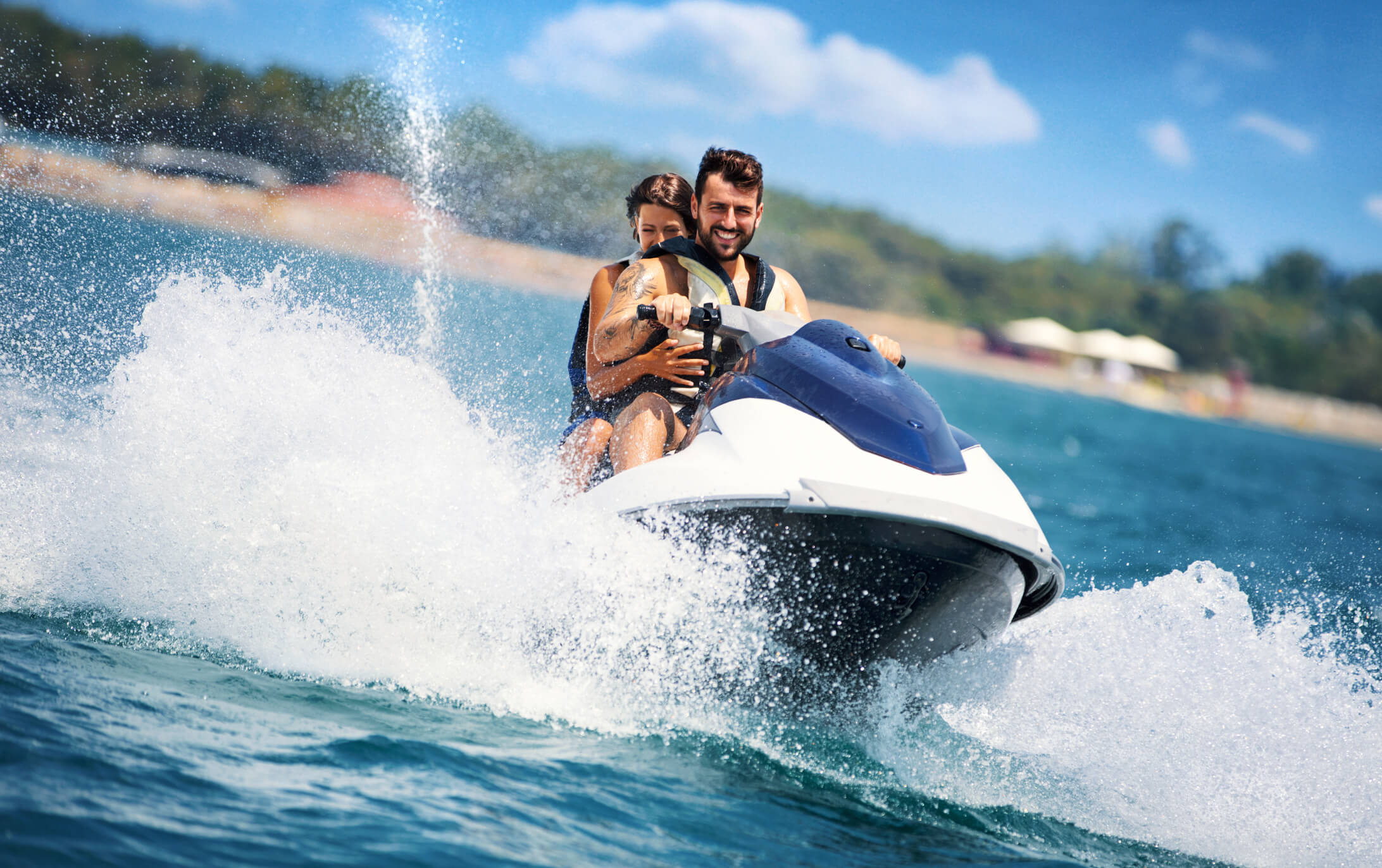 Couple operating jet-ski