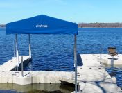 Floating dock with outdoor furniture and awning