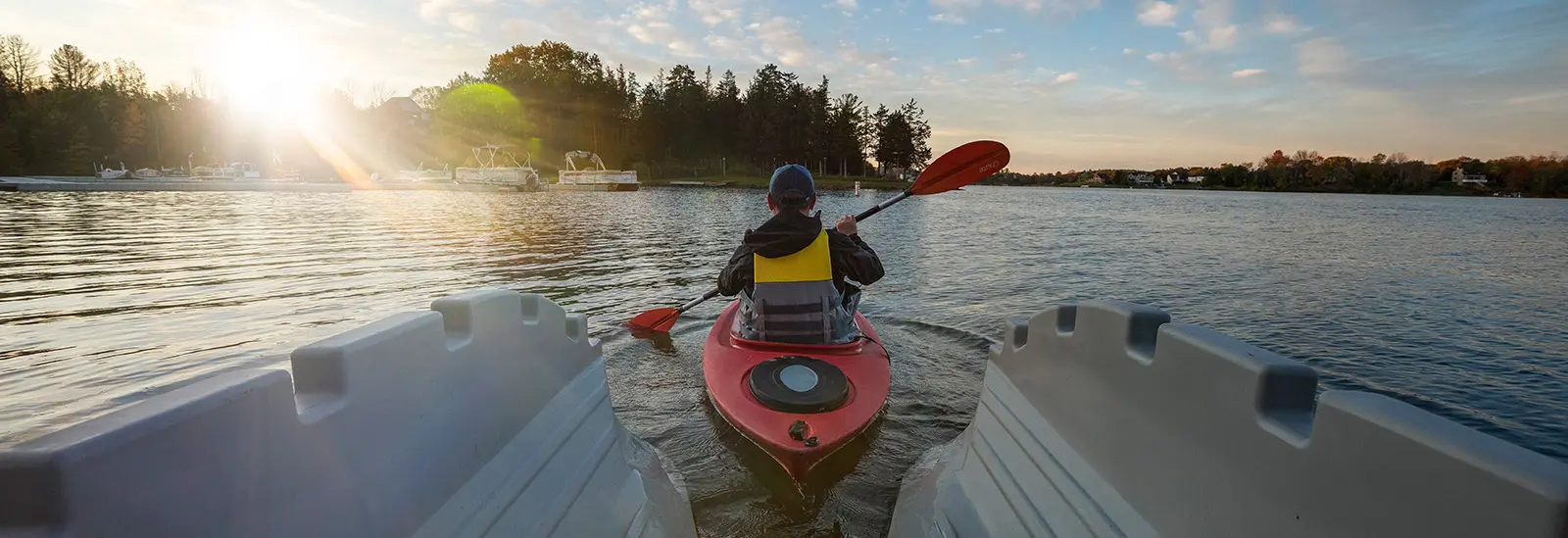 Back view of kayaker coming out of launch