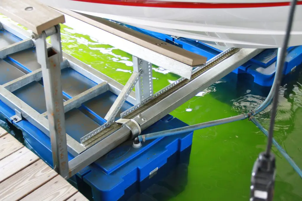 View of boat lift in water