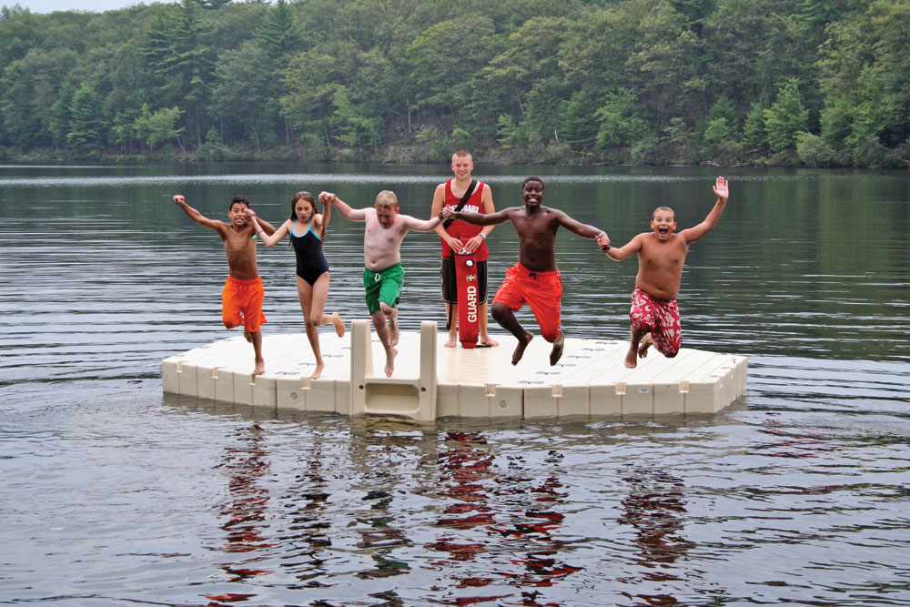 Kids jumping off dock