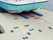 Boat driving onto an EZ Dock boat lift