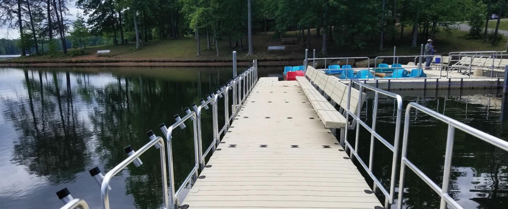 dock on glassy smooth lake